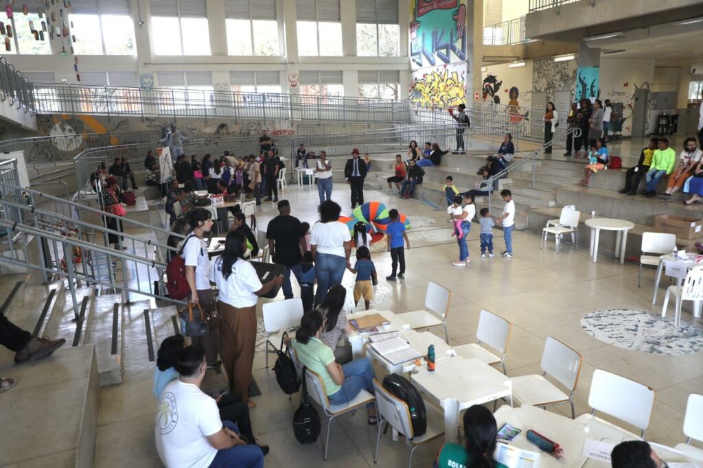 Defensoria Pública de Minas promove educação em direitos e presta atendimentos no Mutirão do Dia do Migrante e do Refugiado  1